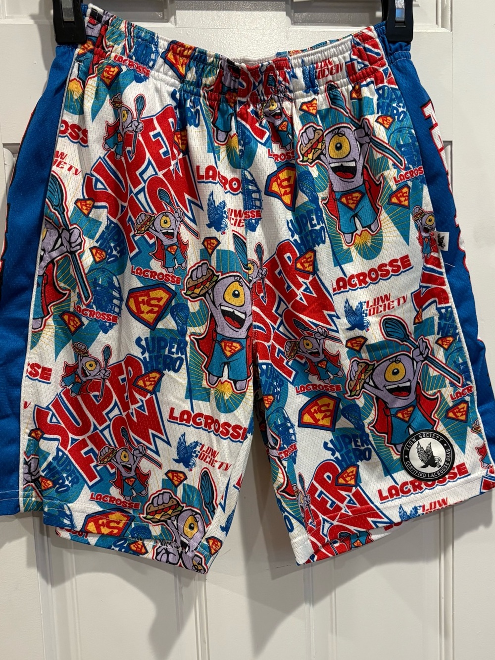 Flow Society Kids Superhero Print Shorts - Blue/Red/White. Size Youth Medium